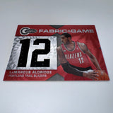 LaMarcus Aldridge 2010-11 Panini Certified Fabric of the Game /299