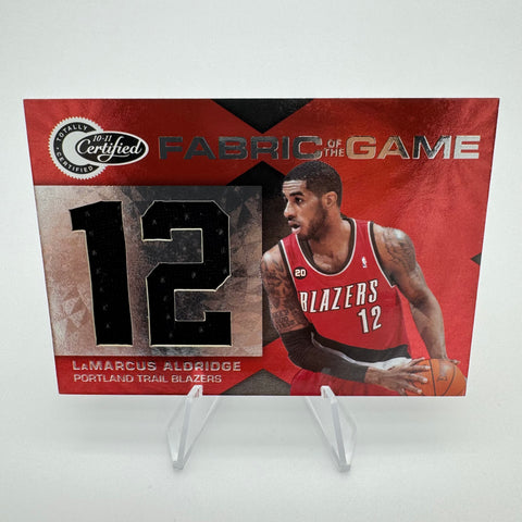 LaMarcus Aldridge 2010-11 Panini Certified Fabric of the Game /299