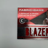 LaMarcus Aldridge 2011 Panini Totally Certified Fabric of the Game /299