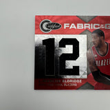 LaMarcus Aldridge 2010-11 Panini Certified Fabric of the Game /299